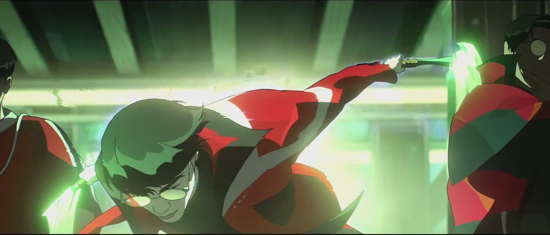 Two red-and-black-clad fighters battle amid green flashes in the Know My Name video.