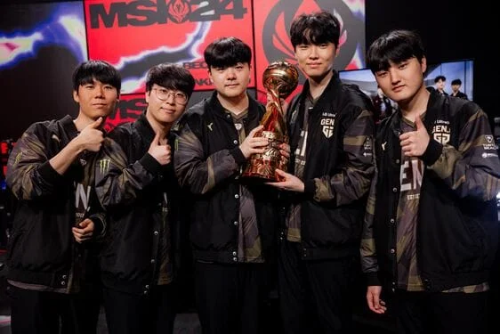 Gen.G League of Legends team celebrating their MSI 2024 victory, holding the trophy on stage
