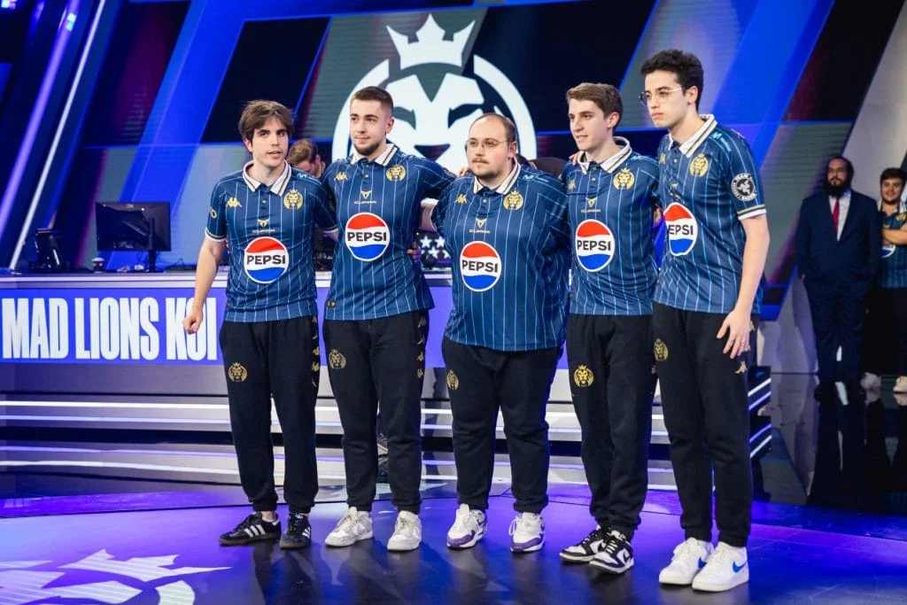 MAD Lions KOI League of Legends team standing together on stage in official jerseys during an LEC match
